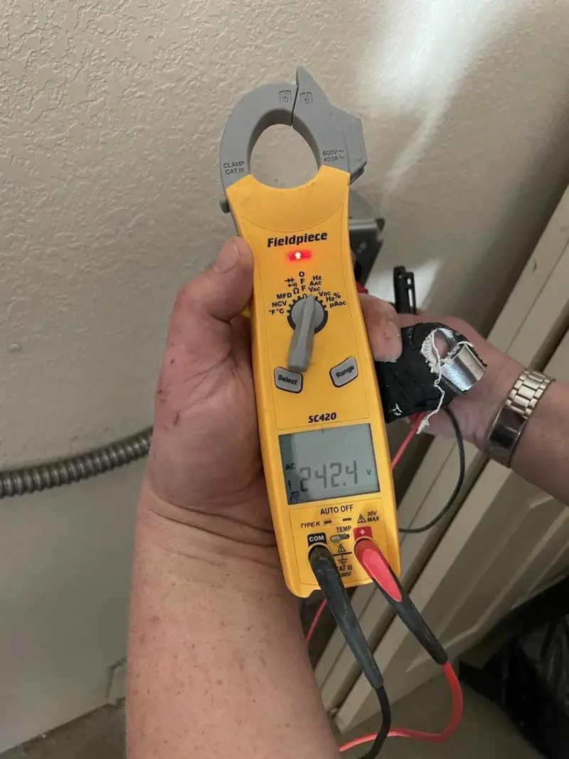 Voltage testing with clamp meter during Generator Installation in O'Neill